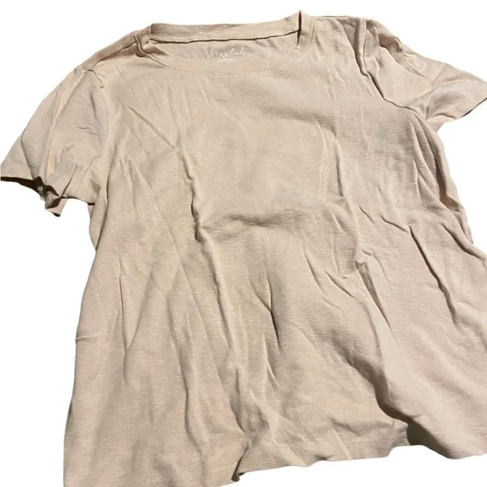 Marked essentials size medium pink tee shirt worn once great condition
